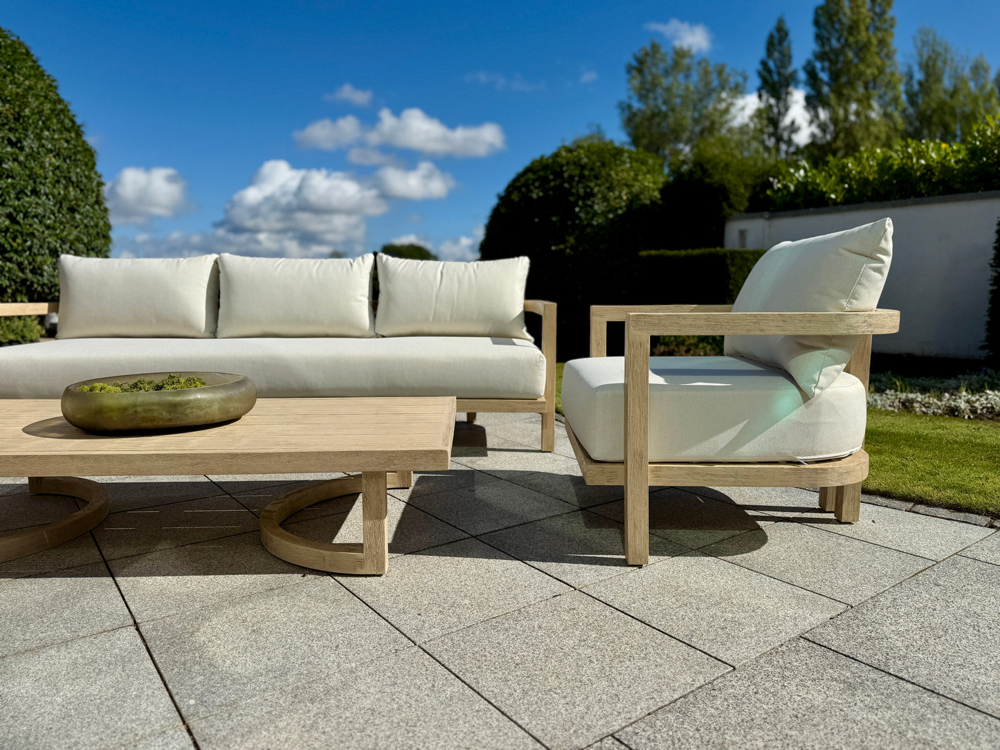 Hamilton Teak outdoor furniture set showing luxury garden seating and one armchair