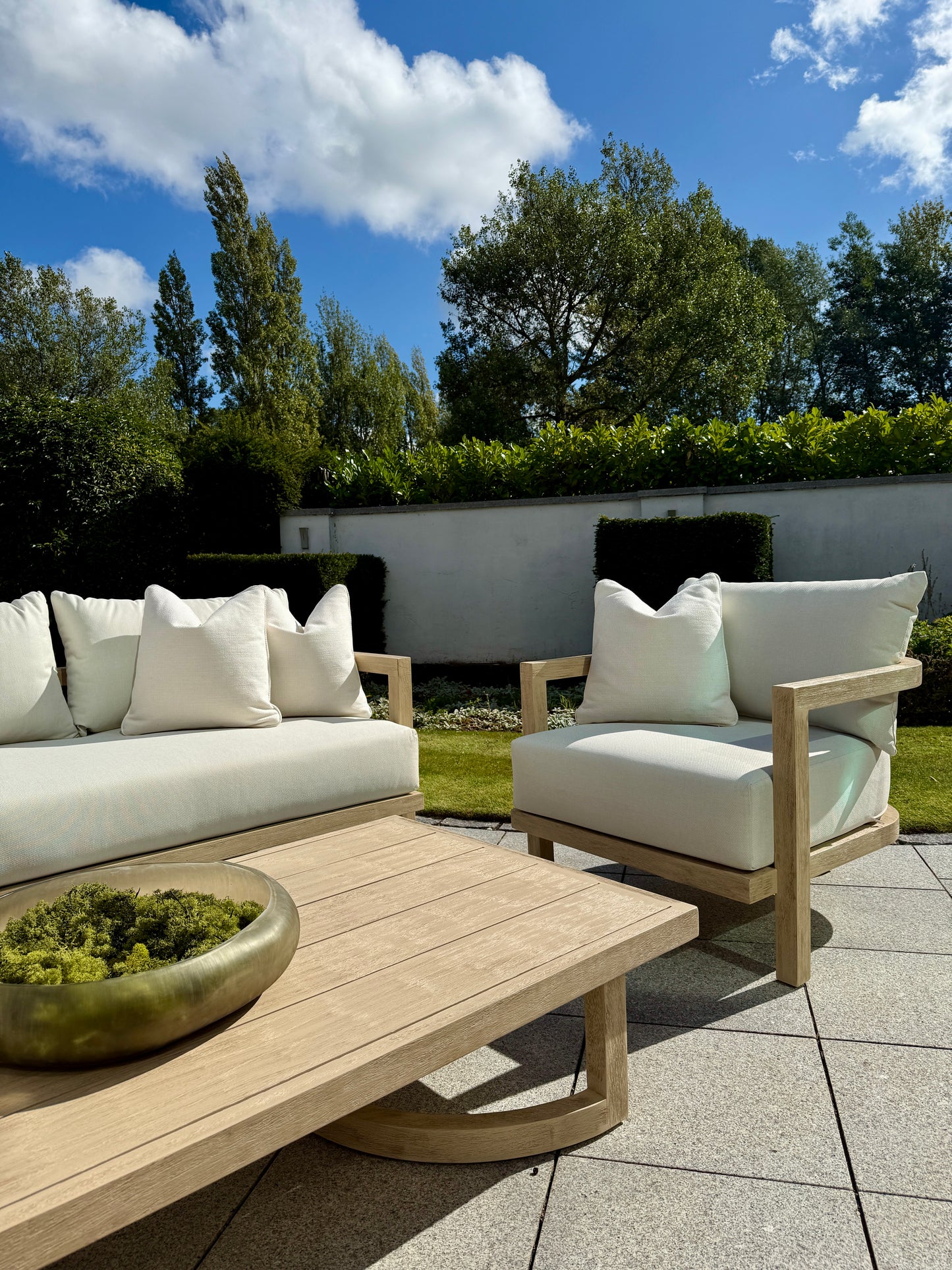 Hamilton Teak armchair side angle showing ergonomic design and craftsmanship