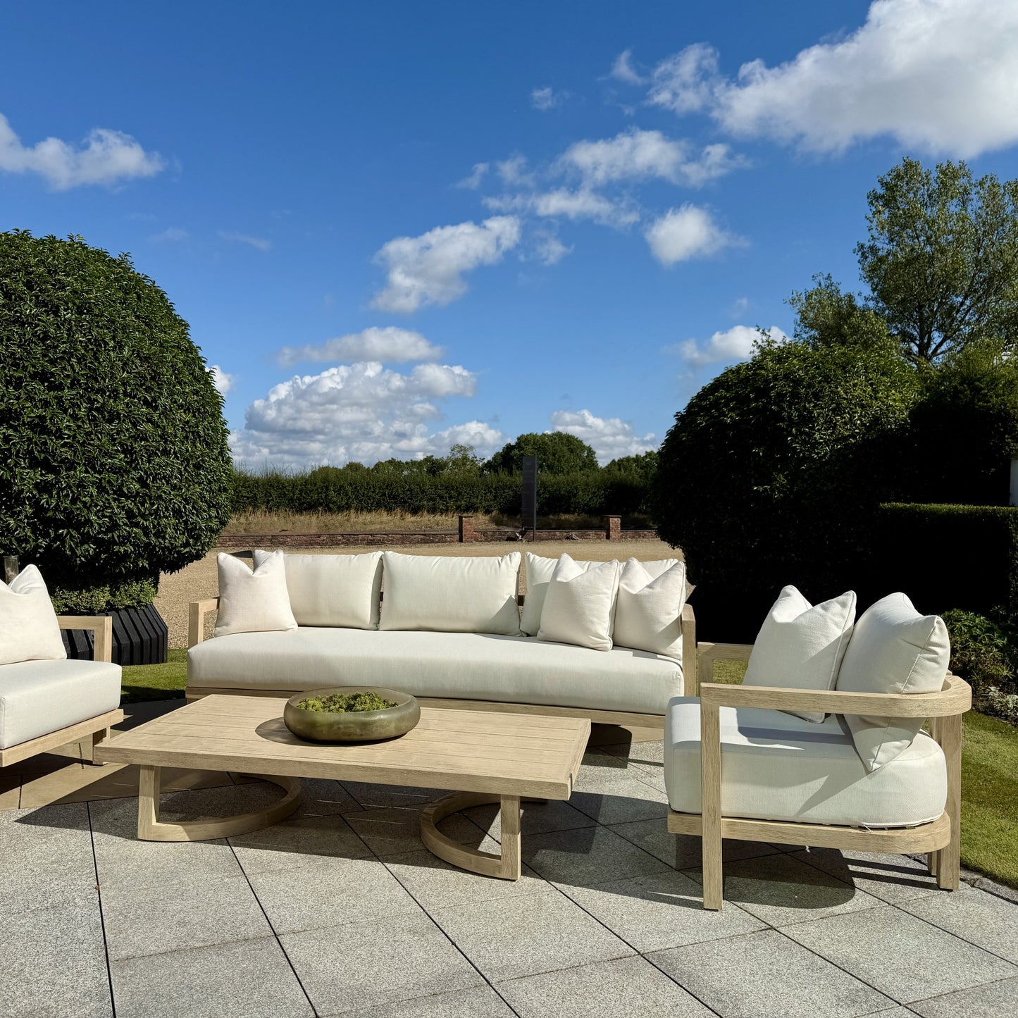 Hamilton Teak outdoor seating arrangement showing weather-resistant design