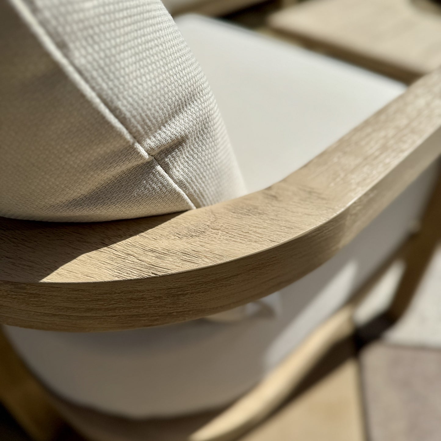 Hamilton Teak armchair close-up showing quality wood and material texture