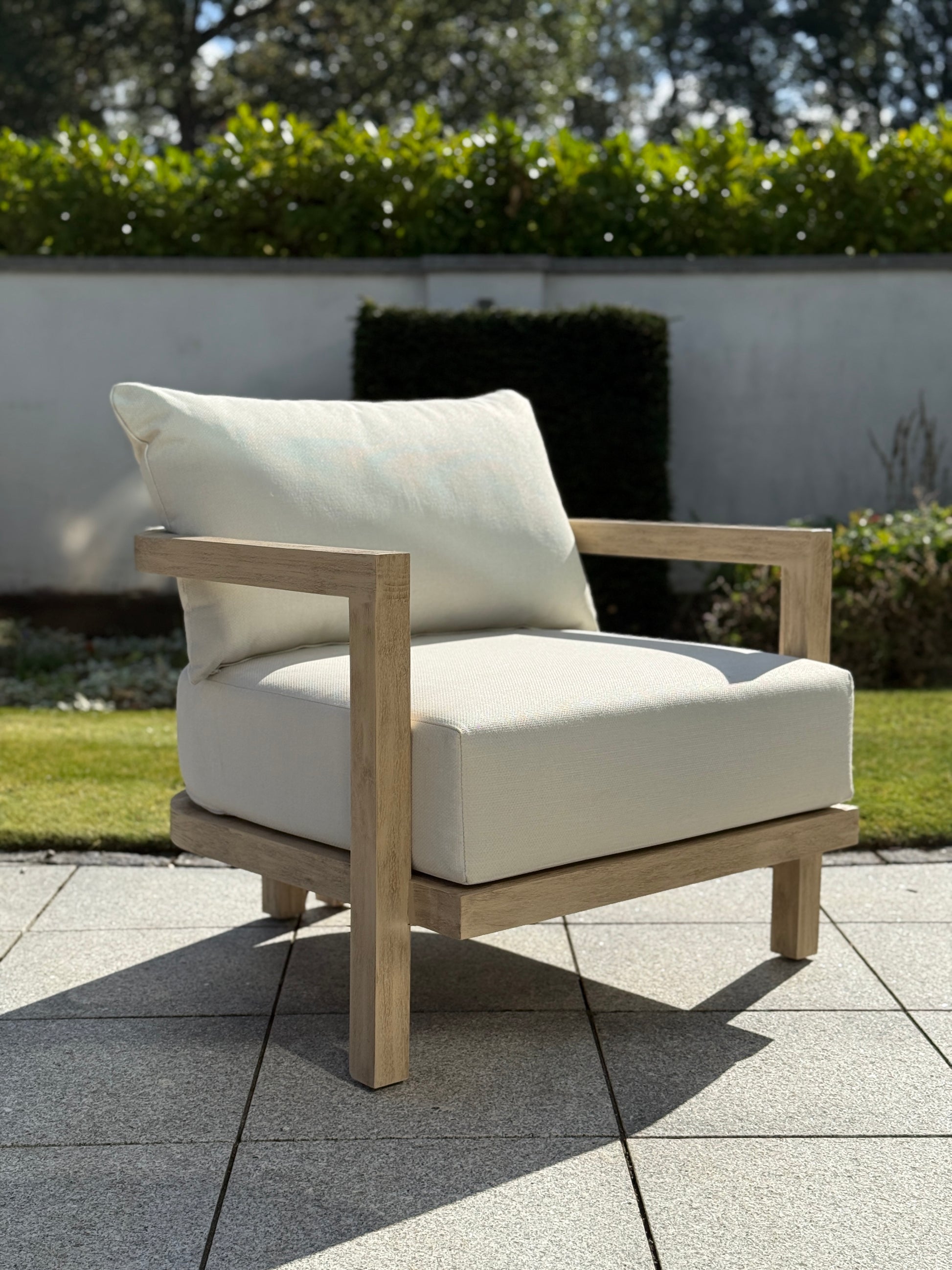 Hamilton Teak armchair front-side view displaying comfortable outdoor seating